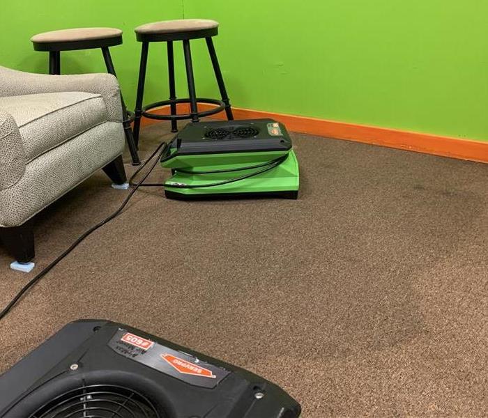 Two SERVPRO fans drying carpet