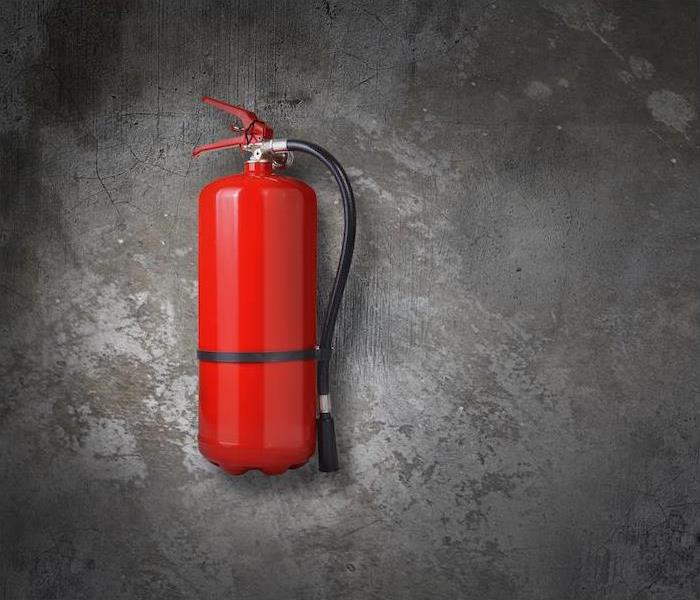 fire extinguisher on a wall